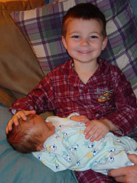 Big brother Drew holding little brother Gavin