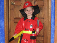 Drew in fireman (firefighter?) suit