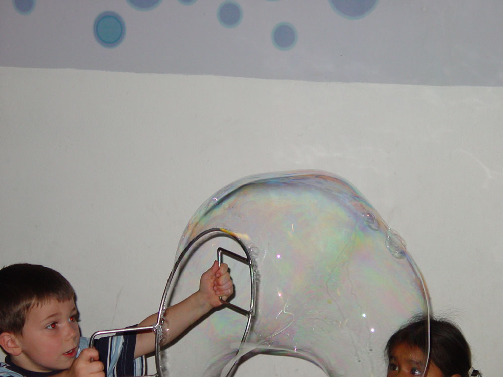 Drew making bubbles at museum