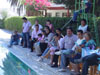 Poolside crowd at baptism