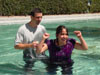 Zalma being baptized