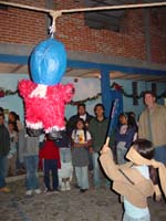 Piñata being hit