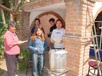 Enjoying the tamales the Ladies Cooking Class made